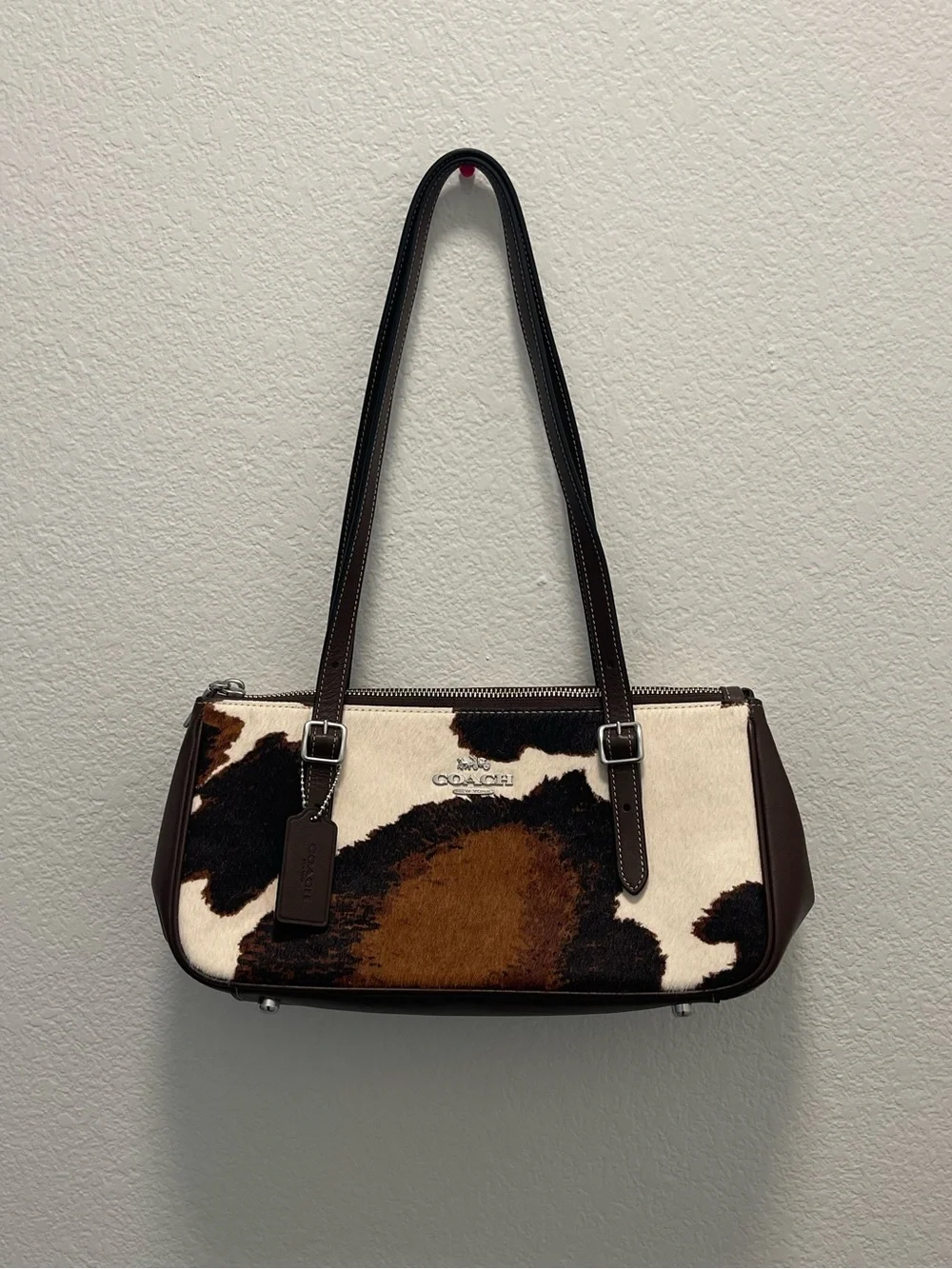 Coach asher cow print